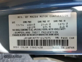 2015 Mazda 3 i Grand Touring with VIN JM1BM1M77F1247075, listed as a Copart auction lot 54559925 with 104,671 mi miles and Salvage title. Bid and sale history available at DreamBid. Image 12.