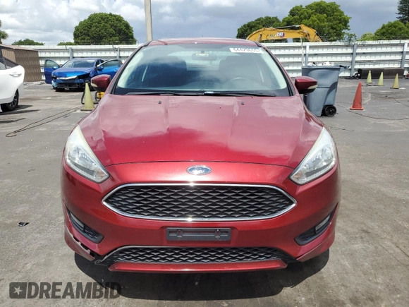2015 Ford Focus SE z VIN 1FADP3F24FL332883, wystawiony jako Copart lot #64429655 z przebiegiem 65 939 mil mil oraz Szkoda całkowita • Salvage title. Historia ofert i sprzedaży dostępna na DreamBid. Obrazek 5.