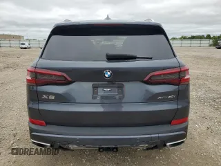 2021 BMW X5 xDrive40i with VIN 5UXCR6C01M9E49207, listed as a Copart auction lot 63399795 with 50,818 mi miles and Salvage title. Bid and sale history available at DreamBid. Image 6.