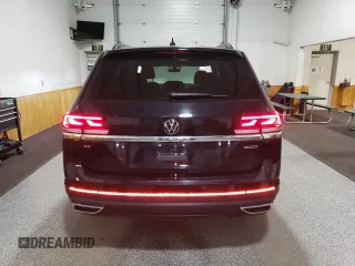 2022 Volkswagen Atlas SE z VIN 1V2LP2CA0NC505050, wystawiony jako Copart lot #52202695 z przebiegiem 28 477 mil mil oraz Czysty tytuł • Clean title. Historia ofert i sprzedaży dostępna na DreamBid. Obrazek 6.