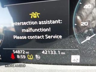 2019 Audi e-tron Prestige with VIN WA1VABGE0KB009718, listed as a IAAI auction lot 42336983 with 54,871 mi miles and . Bid and sale history available at DreamBid. Image 7.