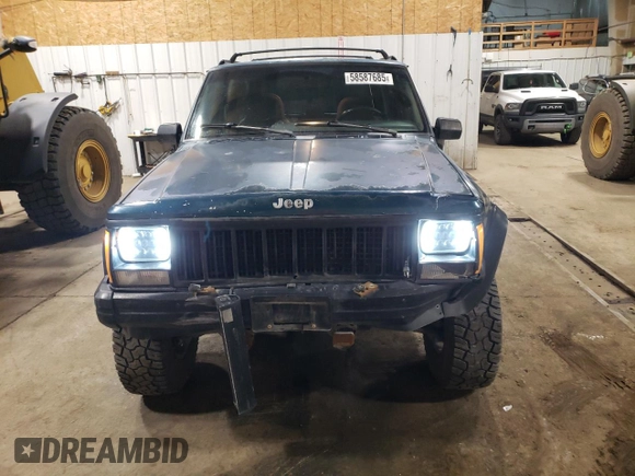1996 Jeep Cherokee Sport with VIN 1J4FJ68S1TL226495, listed as a Copart auction lot 58587685 with 205,397 mi miles and Salvage title. Bid and sale history available at DreamBid. Image 5.