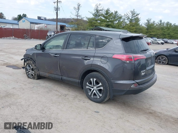 2018 Toyota RAV4 LE with VIN JTMBFREV4JJ742428, listed as a IAAI auction lot 41912813 with 114,159 mi miles. Bid and sale history available at carsss.com. Image 3.