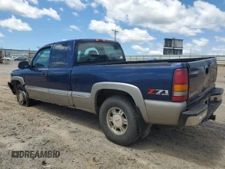 2002 GMC Sierra 1500 SLE with VIN 2GTEK19T621378897, listed as a Copart auction lot 60898315 with 137,509 mi miles and Salvage title. Bid and sale history available at DreamBid. Image 2.