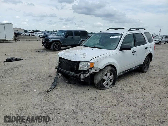 2011 Ford Escape XLT z VIN 1FMCU9D77BKB26159, wystawiony jako Copart lot #59211745 z przebiegiem 252 374 mil mil oraz Szkoda całkowita • Salvage title. Historia ofert i sprzedaży dostępna na DreamBid. Obrazek 14.