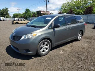 2012 Toyota Sienna with VIN 5TDZK3DC8CS198495, listed as a Copart auction lot 57335205 with 66,786 mi miles and Salvage title. Bid and sale history available at DreamBid. Image 1.