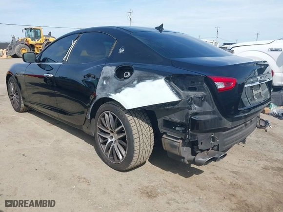 2015 Maserati Ghibli with VIN ZAM57XSA9F1146055, listed as a IAAI auction lot 41814633 with 88,783 mi miles. Bid and sale history available at carsss.com. Image 3.