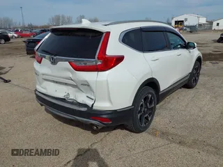 2017 Honda CR-V Touring with VIN 5J6RW2H95HL044505, listed as a IAAI auction lot 41856975 with 117,826 mi miles. Bid and sale history available at carsss.com. Image 4.