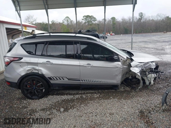 2018 Ford Escape SE z VIN 1FMCU9GD1JUB35184, wystawiony jako IAAI lot #41611285 z przebiegiem 142 267 mil mil oraz . Historia ofert i sprzedaży dostępna na DreamBid. Obrazek 14.