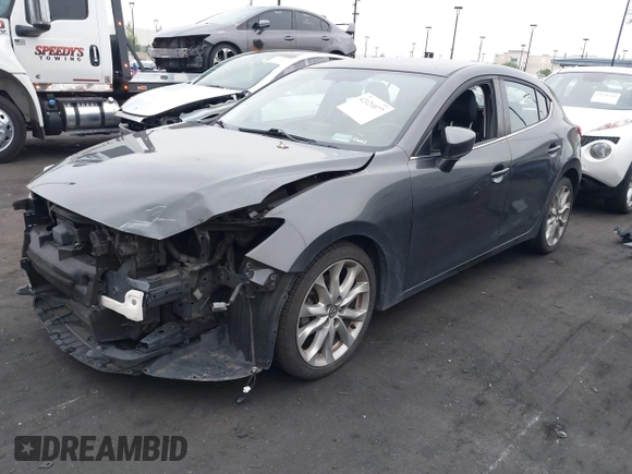 2014 Mazda 3 S Touring with VIN JM1BM1L35E1208952, listed as a IAAI auction lot 42121077 with 183,985 mi miles and . Bid and sale history available at carsss.com. Image 2.