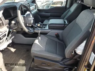 2023 Ford F-150 Lightning Pro z VIN 1FTVW1EL8PWG36508, wystawiony jako Copart lot #54178165 z przebiegiem 18 928 mil mil oraz Szkoda całkowita • Salvage title. Historia ofert i sprzedaży dostępna na DreamBid. Obrazek 7.