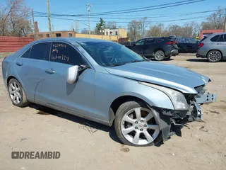 2013 Cadillac ATS z VIN 1G6AA5RX4D0129642, wystawiony jako IAAI lot #42099111 z przebiegiem 205 921 mil mil oraz . Historia ofert i sprzedaży dostępna na DreamBid. Obrazek 1.