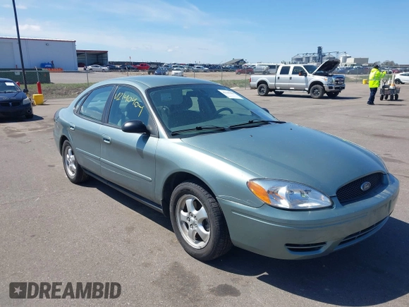 2005 Ford Taurus SE with VIN 1FAFP53U05A273576, listed as a IAAI auction lot 42140404 with 58,735 mi miles. Bid and sale history available at carsss.com. Image 1.