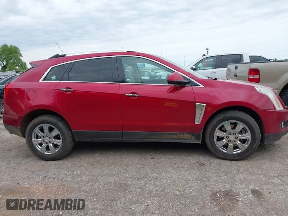 2016 Cadillac SRX Premium Collection z VIN 3GYFNDE37GS525186, wystawiony jako IAAI lot #42179497 z przebiegiem 117 200 mil mil oraz . Historia ofert i sprzedaży dostępna na DreamBid. Obrazek 13.