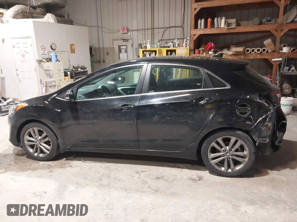 2016 Hyundai Elantra GT with VIN KMHD35LH2GU266352, listed as a IAAI auction lot 41754614 with 155,650 mi miles. Bid and sale history available at carsss.com. Image 14.