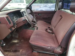 1990 Nissan Frontier z VIN 1N6SD11S8LC377906, wystawiony jako Copart lot #54840925 z przebiegiem 131 024 mil mil oraz Szkody całkowita. Historia ofert i sprzedaży dostępna na DreamBid. Obrazek 7.