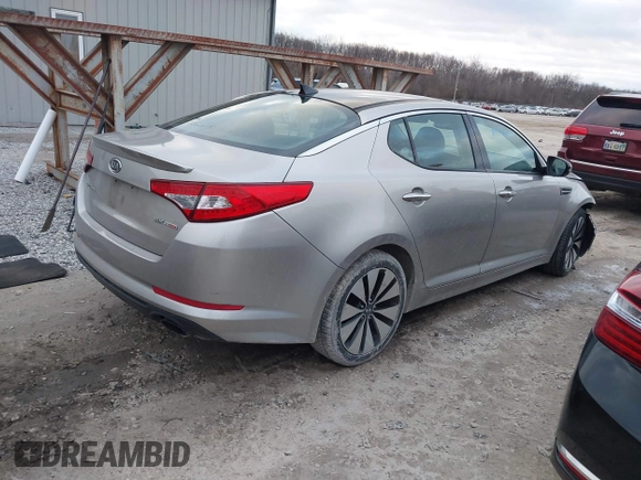 2012 Kia Optima SX with VIN 5XXGR4A62CG027184, listed as a IAAI auction lot 41236626 with 121,686 mi miles and . Bid and sale history available at carsss.com. Image 4.