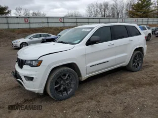 2021 Jeep Grand Cherokee Limited z VIN 1C4RJFBG0MC776148, wystawiony jako Copart lot #51248745 z przebiegiem 123 906 mil mil oraz Szkody całkowita. Historia ofert i sprzedaży dostępna na DreamBid. Obrazek 1.