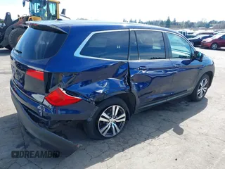 2016 Honda Pilot EX-L with VIN 5FNYF6H5XGB102213, listed as a IAAI auction lot 41861702 with 119,655 mi miles. Bid and sale history available at carsss.com. Image 4.