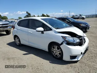 2015 Honda Fit LX with VIN 3HGGK5G55FM748175, listed as a Copart auction lot 56556915 with 98,858 mi miles and Salvage title. Bid and sale history available at DreamBid. Image 4.