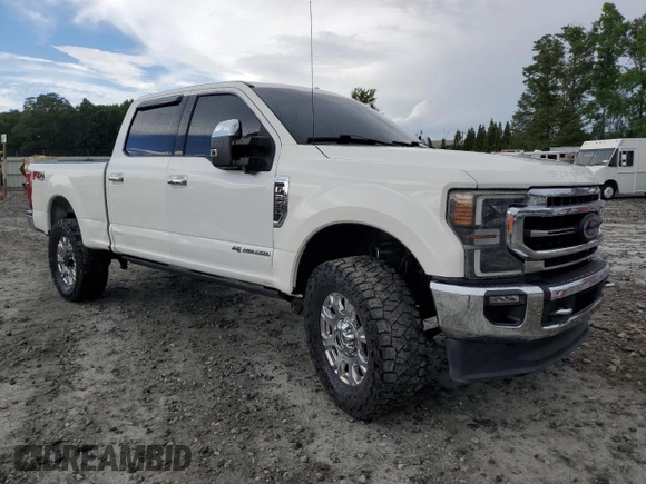 2021 Ford F-250 XL with VIN 1FT8W2BTXMEC41464, listed as a Copart auction lot 61588905 with 131,973 mi miles and Salvage title. Bid and sale history available at DreamBid. Image 4.