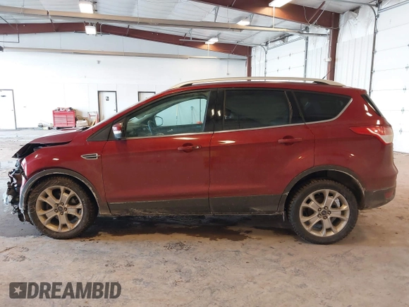 2014 Ford Escape Titanium with VIN 1FMCU0JX6EUC58726, listed as a IAAI auction lot 41656779 with 162,888 mi miles. Bid and sale history available at carsss.com. Image 14.