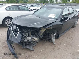 2021 Acura TLX Technology with VIN 19UUB5F42MA009559, listed as a IAAI auction lot 42245295 with 59,902 mi miles and . Bid and sale history available at DreamBid. Image 6.