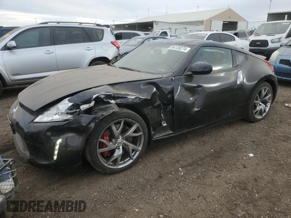 2014 Nissan 370Z Touring with VIN JN1AZ4EH2EM633814, listed as a Copart auction lot 84120274 with 22,979 mi miles and Salvage Title. Bid and sale history available at carsss.com. Image 1.