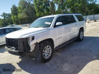 2015 Chevrolet Suburban LT with VIN 1GNSCJKC2FR738634, listed as a Copart auction lot 53527545 with 259,856 mi miles and Salvage Title. Bid and sale history available at carsss.com. Image 1.
