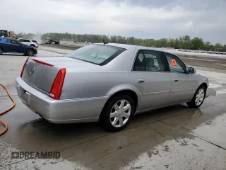 2006 Cadillac DTS 1SD z VIN 1G6KD57Y26U115094, wystawiony jako Copart lot #53534355 z przebiegiem 126 631 mil mil oraz Szkoda całkowita • Salvage title. Historia ofert i sprzedaży dostępna na DreamBid. Obrazek 3.