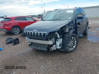 2021 Jeep Cherokee Latitude Lux with VIN 1C4PJLMX2MD107165, listed as a IAAI auction lot 42456893 with 62,625 mi miles and . Bid and sale history available at DreamBid. Image 6.