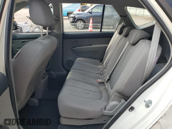 2009 Kia Rondo LX Base with VIN KNAFG528397259136, listed as a Copart auction lot 75529894 with 110,680 mi miles and Salvage Title. Bid and sale history available at carsss.com. Image 11.