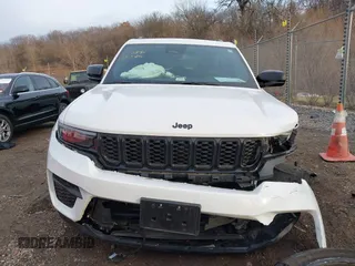 2023 Jeep Grand Cherokee Laredo with VIN 1C4RJHAG6PC620620, listed as a IAAI auction lot 41086775 with 17,882 mi miles and . Bid and sale history available at DreamBid. Image 13.