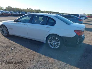 2014 BMW 7 Series ALPINA B7 with VIN WBAYE8C59ED134562, listed as a IAAI auction lot 41806222 with 120,043 mi miles. Bid and sale history available at carsss.com. Image 3.
