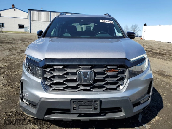 2022 Honda Passport TrailSport z VIN 5FNYF8H61NB026883, wystawiony jako Copart lot #49298085 z przebiegiem 18 600 mil mil oraz Szkoda całkowita • Salvage title. Historia ofert i sprzedaży dostępna na DreamBid. Obrazek 5.