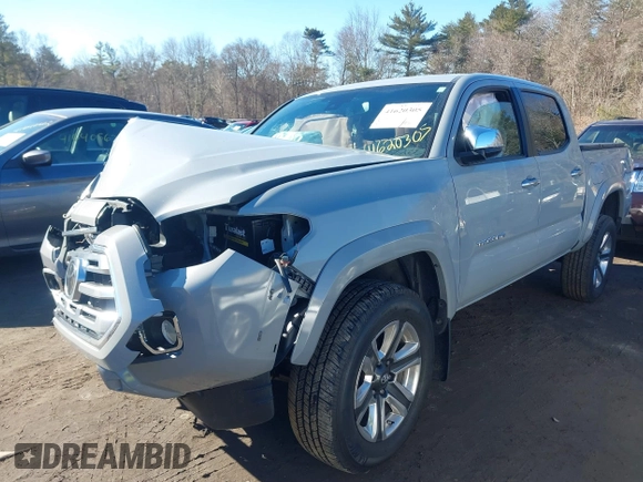 2018 Toyota Tacoma SR with VIN 3TMGZ5AN7JM165084, listed as a IAAI auction lot 41620305 with 21,010 mi miles. Bid and sale history available at carsss.com. Image 2.
