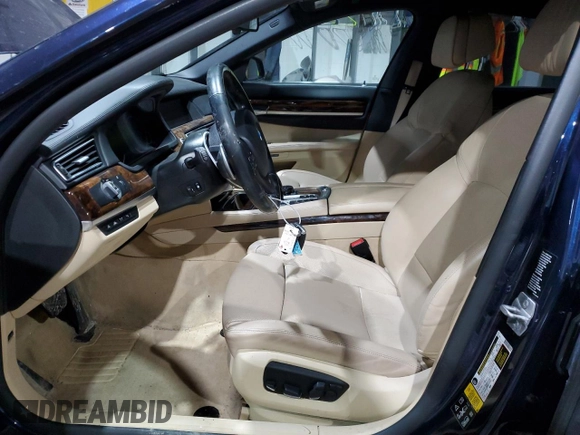 2015 BMW 7 Series 750i xDrive with VIN WBAYB6C57FD965931, listed as a Copart auction lot 44422205 with 100,702 mi miles and Salvage title. Bid and sale history available at DreamBid. Image 7.