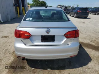 2012 Volkswagen Jetta TDI w/Premium & Nav z VIN 3VWLL7AJ9CM069918, wystawiony jako Copart lot #58237365 z przebiegiem 107 890 mil mil oraz Szkoda całkowita • Salvage title. Historia ofert i sprzedaży dostępna na DreamBid. Obrazek 6.