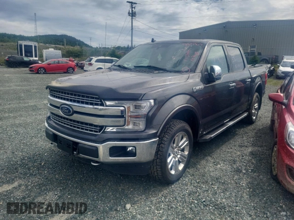 2020 Ford F-150 XL with VIN 1FTEW1E58LKF49324, listed as a Copart auction lot 58653615 with 118,520 mi miles and Salvage title. Bid and sale history available at DreamBid. Image 1.