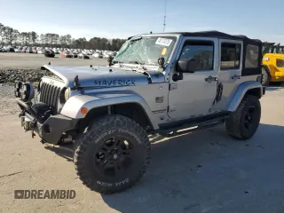 2015 Jeep Wrangler Unlimited Wrangler X with VIN 1C4BJWEG7FL580885, listed as a Copart auction lot 48891605 with 104,448 mi miles and Salvage title. Bid and sale history available at DreamBid. Image 1.