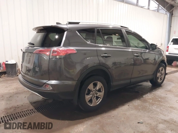 2016 Toyota RAV4 XLE with VIN 2T3RFREV5GW534129, listed as a IAAI auction lot 42359801 with 52,025 mi miles and . Bid and sale history available at DreamBid. Image 4.
