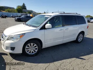 2012 Volkswagen Routan SE with VIN 2C4RVABG2CR353990, listed as a Copart auction lot 63118645 with 136,780 mi miles and Salvage title. Bid and sale history available at DreamBid. Image 1.