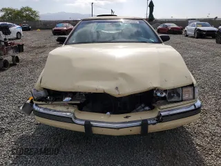 1992 Cadillac Seville z VIN 1G6KS53B0NU837105, wystawiony jako Copart lot #55865205 z przebiegiem 94 740 mil mil oraz Szkody całkowita. Historia ofert i sprzedaży dostępna na DreamBid. Obrazek 5.