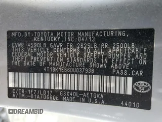 2013 Toyota Avalon XLE with VIN 4T1BK1EB6DU037938, listed as a Copart auction lot 62709525 with 104,616 mi miles and Salvage title. Bid and sale history available at DreamBid. Image 12.