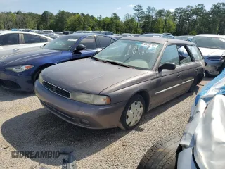 1996 Subaru Legacy L with VIN 4S3BK435XT7313957, listed as a Copart auction lot 48557185 with 191,300 mi miles and Salvage title. Bid and sale history available at DreamBid. Image 1.