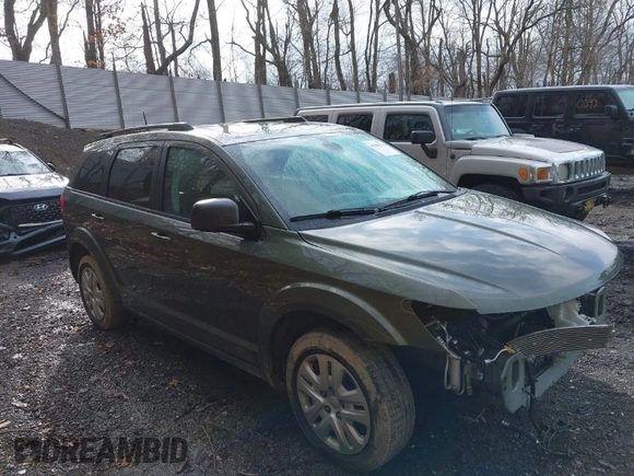 2018 Dodge Journey SE with VIN 3C4PDCABXJT496661, listed as a IAAI auction lot 41908124 with 82,257 mi miles. Bid and sale history available at carsss.com. Image 1.
