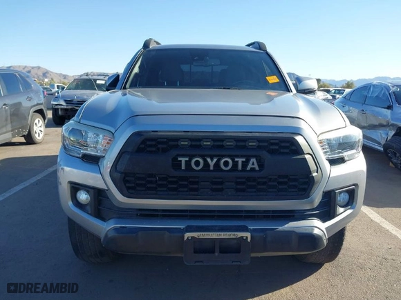 2018 Toyota Tacoma SR with VIN 3TMCZ5AN1JM141605, listed as a IAAI auction lot 41558201 with 91,855 mi miles. Bid and sale history available at carsss.com. Image 12.