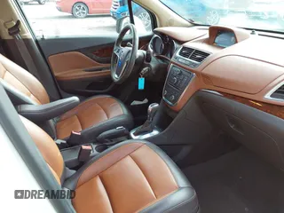 2016 Buick Encore Premium with VIN KL4CJDSB3GB607132, listed as a IAAI auction lot 41526249 with 50,617 mi miles and . Bid and sale history available at carsss.com. Image 5.