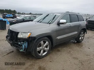2013 Jeep Grand Cherokee Overland with VIN 1C4RJFCT7DC522416, listed as a Copart auction lot 44614375 with 170,786 mi miles and Salvage Title. Bid and sale history available at carsss.com. Image 1.