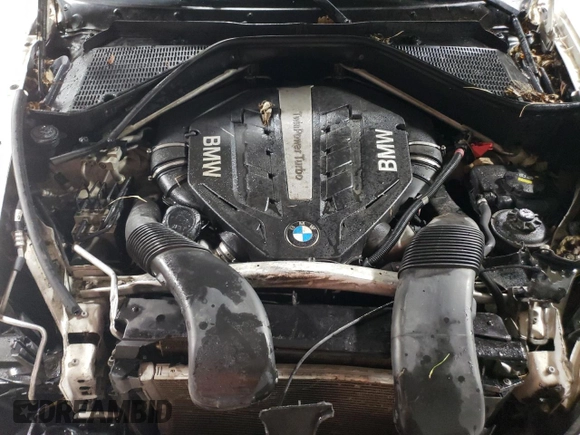 2013 BMW X6 xDrive50i z VIN 5UXFG8C53DL591536, wystawiony jako Copart lot #82219394 z przebiegiem 191 439 mil mil oraz Szkoda całkowita • Salvage title. Historia ofert i sprzedaży dostępna na DreamBid. Obrazek 11.